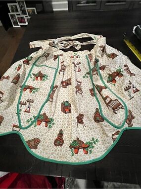 vintage half apron with a 1960s or 1970s country-kitchen or granny core